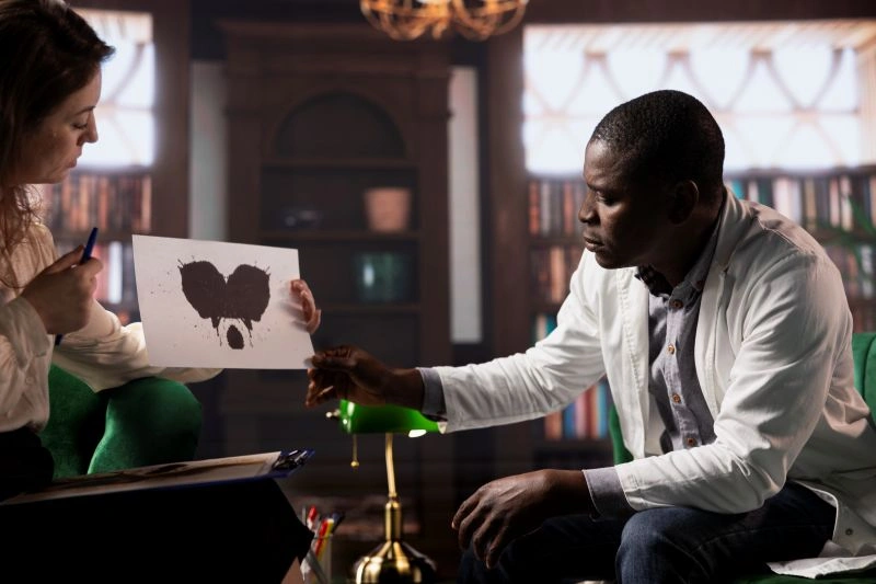 A therapy session featuring the Rorschach inkblot test, a common psychological assessment used in the treatment of borderline personality disorder.