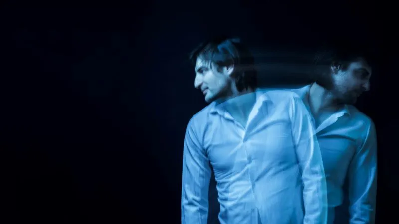 Exploring mood disorder vs personality disorder: A man experiencing the effects of mental health challenges, symbolizing emotional instability.