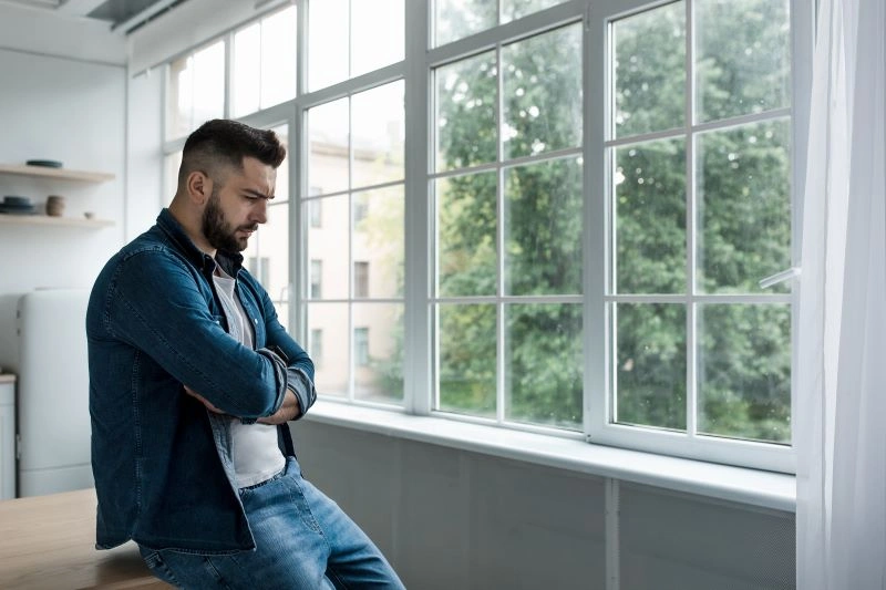 Cognitive Behavioral Therapy for General Anxiety Disorder: A man experiencing emotional distress, potentially benefiting from CBT to manage anxiety.