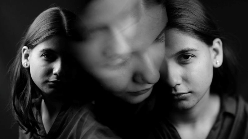 Multiple portraits showing different emotional states related to seasonal affective disorder bipolar symptoms and mood changes.